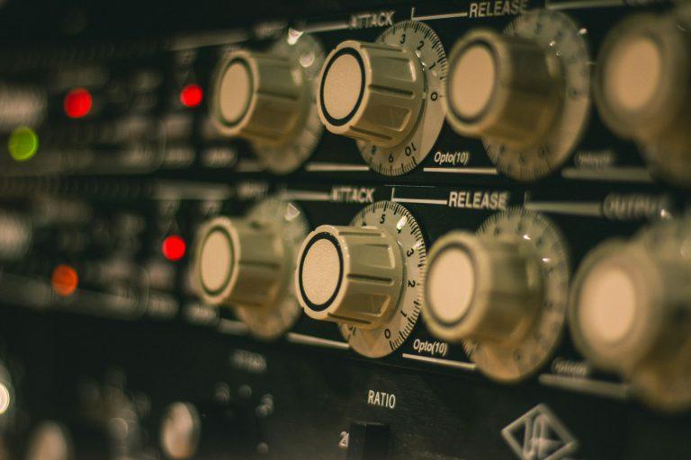 Close-up of audio equipment knobs